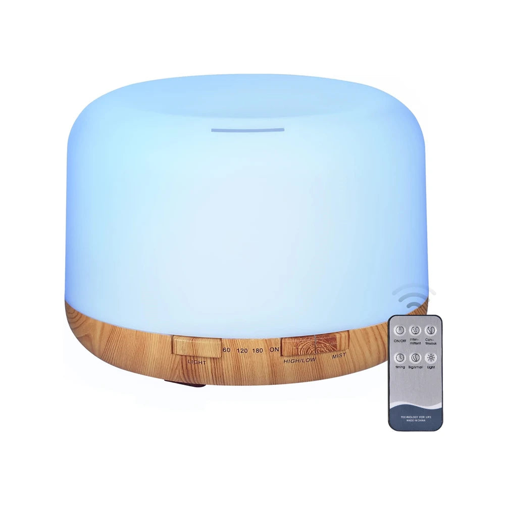 Aromatherapy diffuser with wooden base and remote control on a white background
