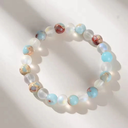 Aura Quartz & Ocean Sediment Bracelet – Healing Crystal Jewelry for Abundance, Balance & Clarity