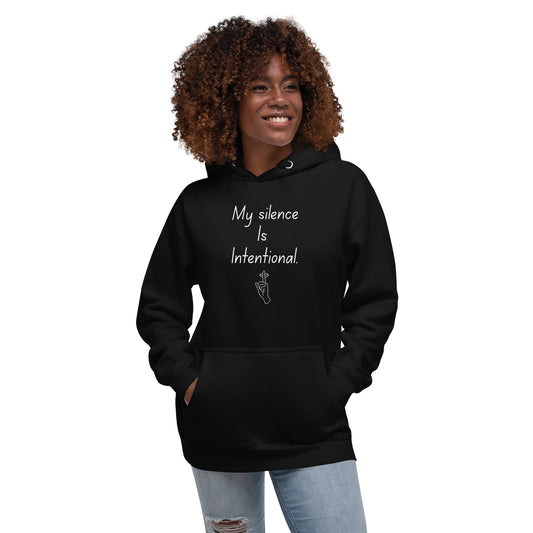 Black unisex hoodie with bold white text: “My silence is strategy.” Centered on chest with minimalist chess pawn illustration. Intentional, resilient design.