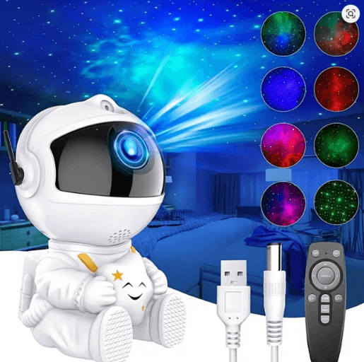 White robot toy with star projector, remote control, and USB cable on a blue bedroom background.